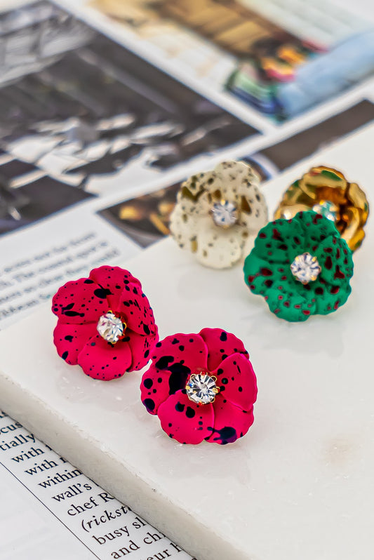 Metal flower earrings with rhinestone center